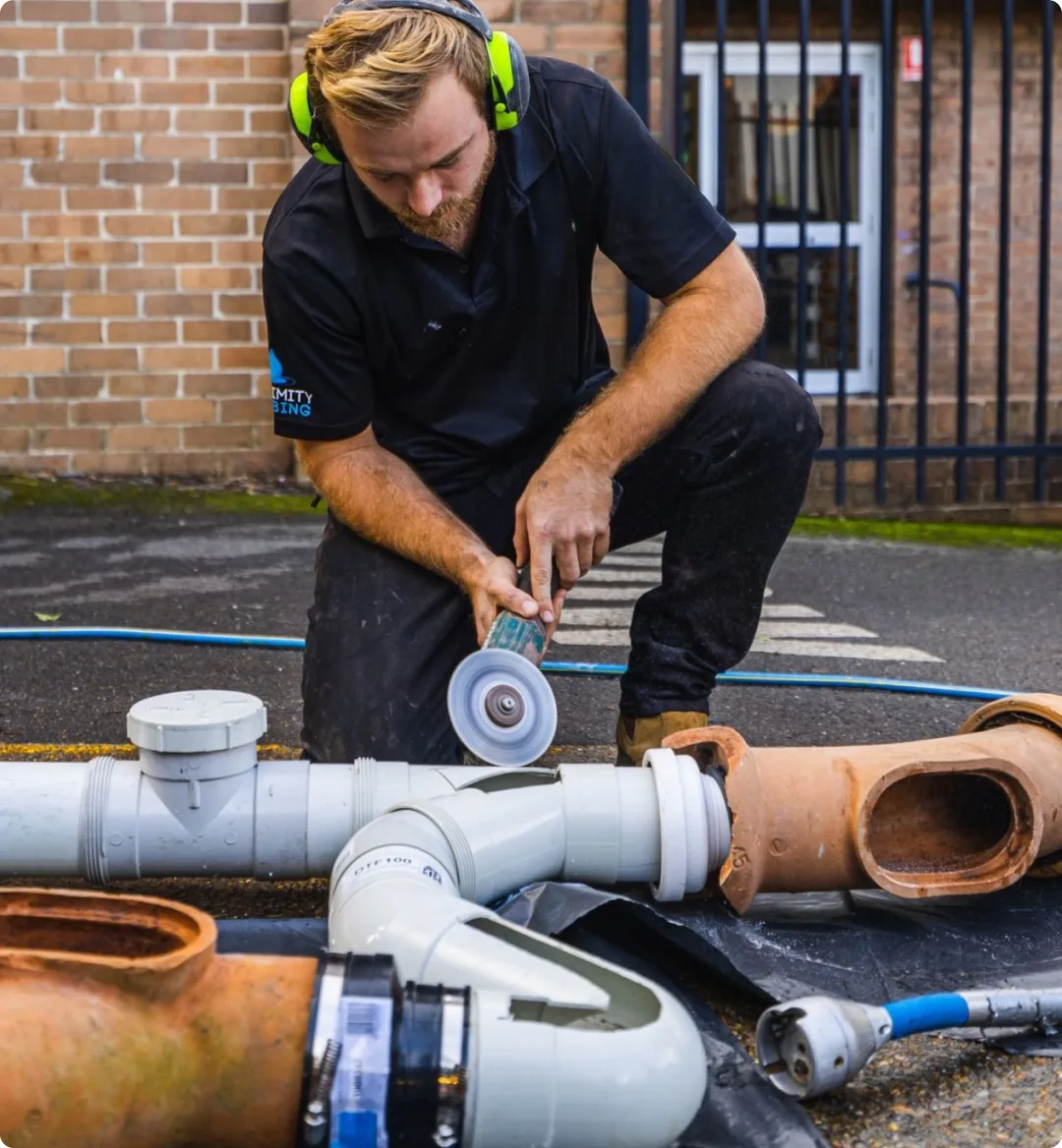 Cutting and fitting drain pipe sections on site